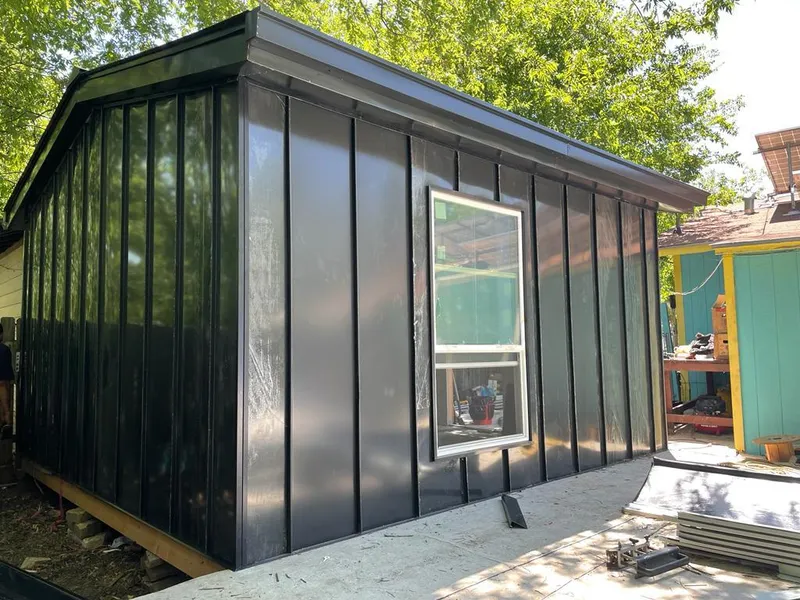 Black standing seam metal wall panels for Roof Inspection in Glasgow