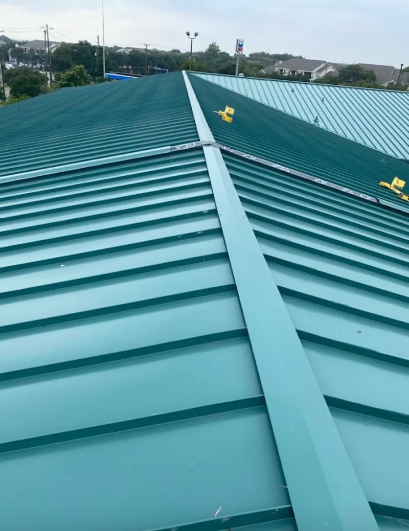 Green commercial metal roof ridge and valley for Metal Roof Repair in Glasgow